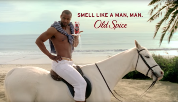 Man on horse holding Old Spice and diamonds on the beach